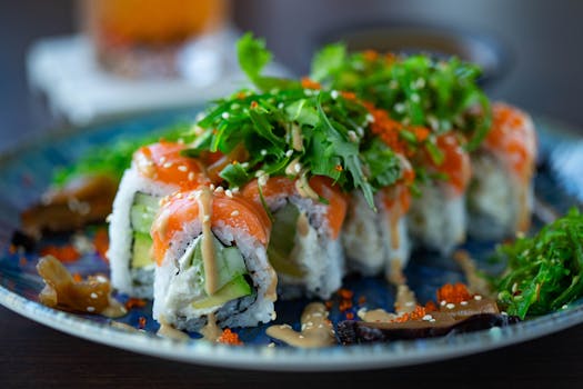 a plate of salmon with greens