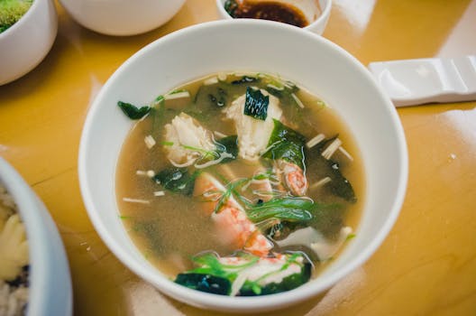 bowl of miso soup with greens